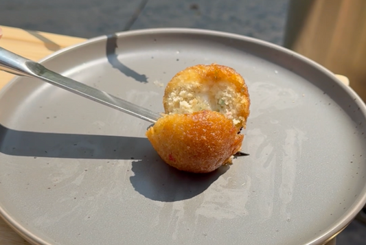 Perfectly Cooked Donut Hole From a Campfire