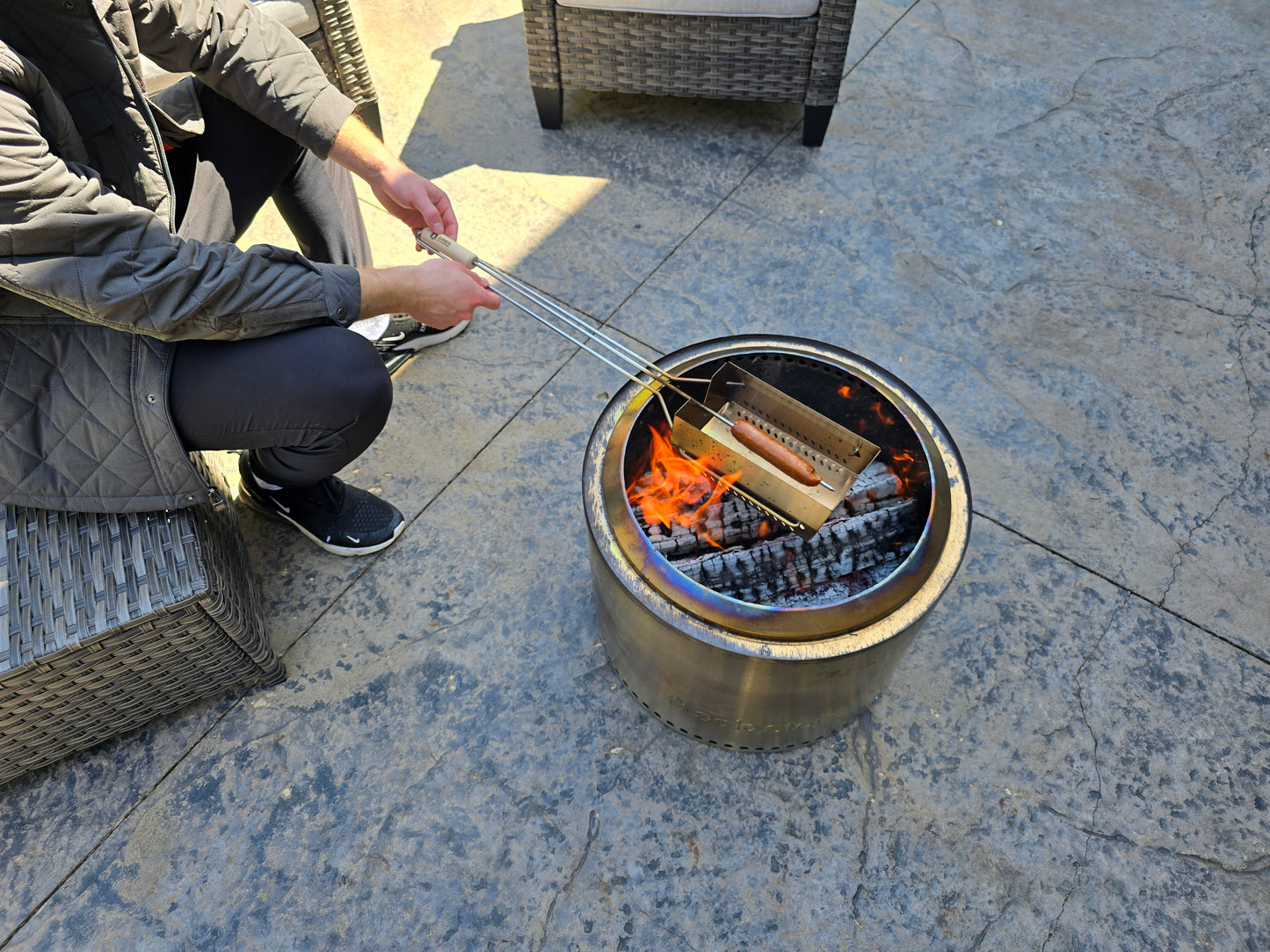 Action shot of roaster cooking a hot dog. Shows how easy and stress-free it is to use the roaster.